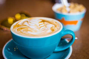 Cappuccino in Big Blue Cups in Modern Vegan Cafe