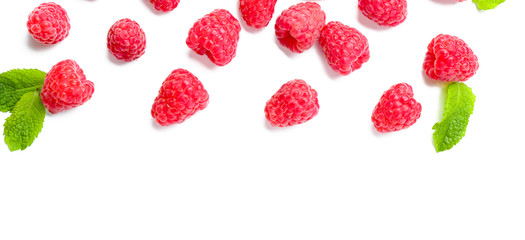 Delicious ripe raspberries with mint on white background