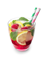 Glass of fresh raspberry mojito on white background