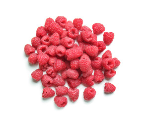 Fresh ripe raspberries on white background
