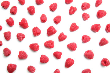 Fresh ripe raspberries on white background