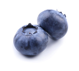 Ripe blueberries on white background