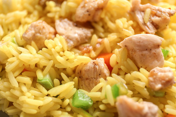 Delicious rice with meat and vegetables, closeup