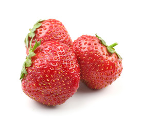 Ripe strawberries on white background