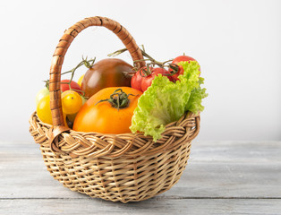 Summer basket with vegetables. A mix of vegetables