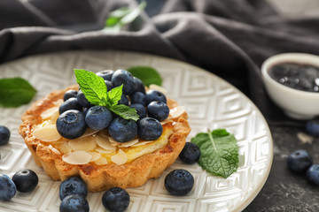 Delicious blueberry tart on plate