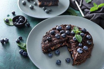 Delicious blueberry chocolate cake on plate