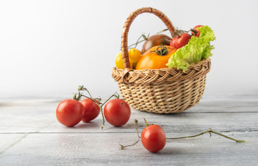 Summer basket with vegetables. A mix of vegetables