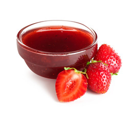 Bowl with delicious strawberry jam on white background