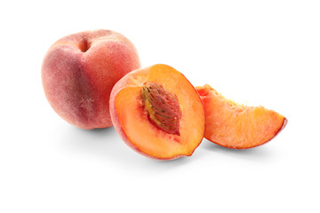 Fresh peaches on white background