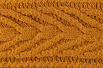 Orange color cotton knitted textile with pattern as background