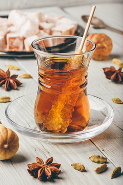 Tea in armudu glass with turkish delight Rahat Lokum, different spices and navat sugar
