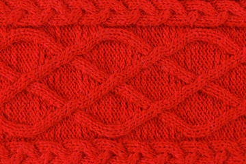Red color cotton knitted textile with pattern as background