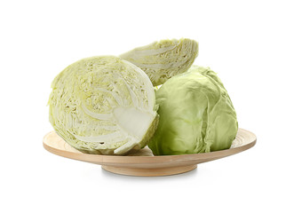 Plate with whole and sliced cabbage on white background