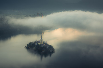 Church on the island at foggy morning in Bled, Slovenia