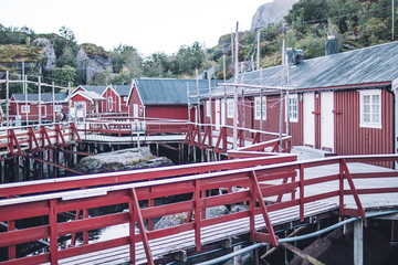 traditional norwegian fishing houses in red, nusfjord, norway