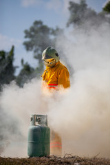 Obraz premium Firefighter with fire and suit for protect fire fighter for training firefighters.