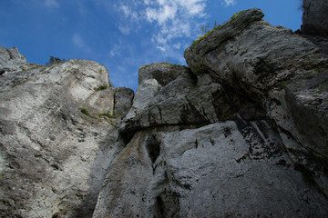 Fototapeta premium rock against the blue sky, Jura Krakowsko-Częstochowska - makroregion geograficzny położony w południowej Polsce