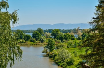 Obraz premium Spring mountain landscape. Beautiful lakes and mountains in the background.