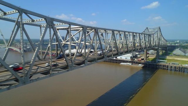 Aerial flyover metal industrial bridge over water