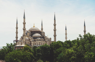 Fototapeta na wymiar Historic Landmark Sultanahmet Mosque in Istanbul. Exterior view of the mosque and minarets. 