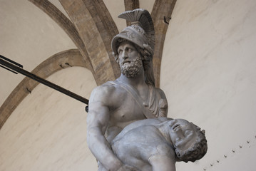 Florence, Italy / August 16 2018: Aiace and Achille marble sculpture, located in Loggia de' Lanzi, in piazza della Signoria
