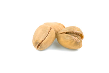 salted pistachios isolated on white background