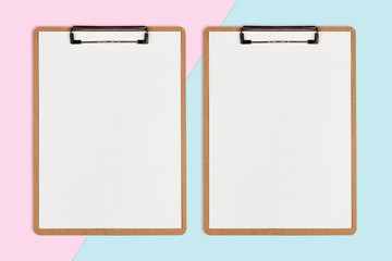 Two clipboard with white sheet on pastel color background, Minimal concept
