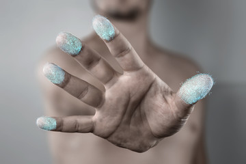 Scanning a fingerprint for identification. The concept of security system, the technology of scanning a fingerprint.