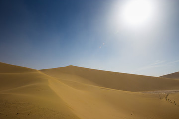 Fototapeta na wymiar Empty Desert in Sand storm over blue sky summer on Silk Road