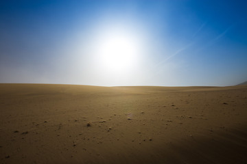 Empty Desert in Sand storm over blue sky summer on Silk Road
