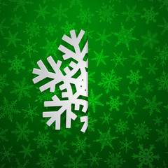 Christmas illustration with one white big snowflake which protrudes from the cut on a snowy background in green colors