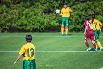 女子サッカー試合風景