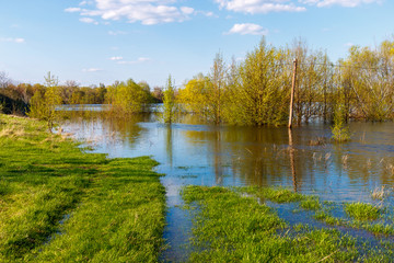 Flooded rural road. Spring flood river Don, Russia