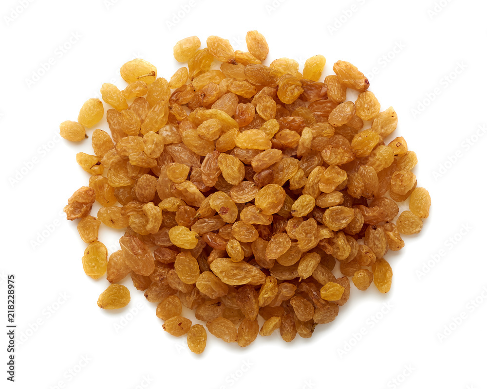 Wall mural Heap of yellow raisins isolated on white background. Top view.