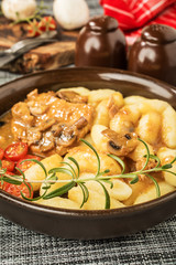 Braised pork chop with mushrooms.