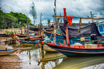 Fototapeta na wymiar Thai fishing boats at the harbor, Prachuap Khiri Khan, Thailand.