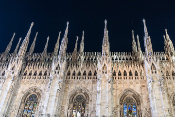 Catholic Church Duomo Di Milano illuminated at night from Italy