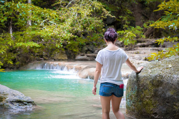 Fototapeta premium hipster woman travelling at jungle nature backgrounds park garden yard outdoors