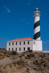 Fototapeta na wymiar Big lighthouse of the Favaritx in Menorca