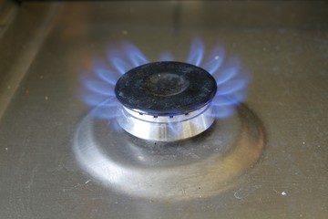The gas burns on the burner
