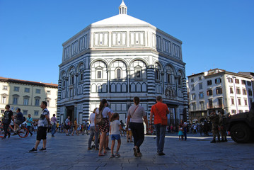 Florence, Italy / August 16 2018: a view of piazza Duomo, with Saint John Baptistery 
