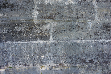 Stone wall of gray with old texture