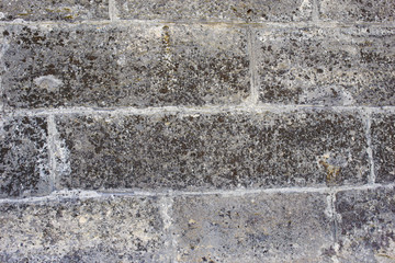 Stone wall of gray with old texture