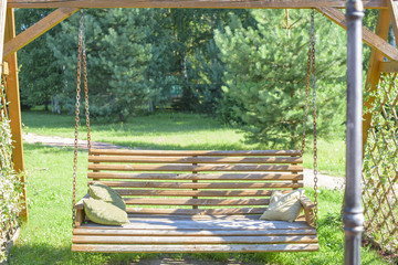 wooden garden swing - obrazy, fototapety, plakaty