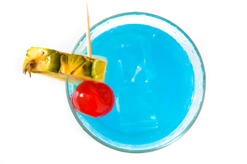 Blue Hawaiian cocktail on white background. Top view