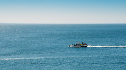 Fishing boat returning to home harbor, Portugal