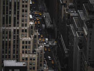 new york architecture streets from above with yellow taxi in focus