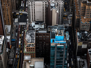 new york streets seen from above with architecture and yellow taxi