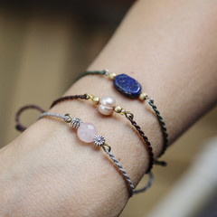 Elegant bracelets on female hand